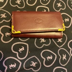 Cartier burgundy Leather key holder with Gold Accents